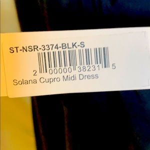 Mid length black dress